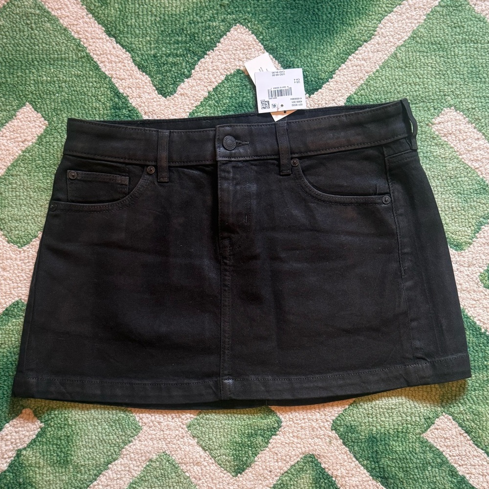 NWT AE stretch low rise A-line black denim mini skirt size 4